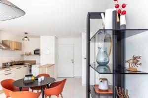 Appartements Canon proche de la gare maritime au rdc : photos des chambres