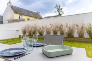 Appartements Canon proche de la gare maritime au rdc : photos des chambres