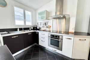 Appartements Grand appartement Cosy - Terrasse - 50m de l’ocean : photos des chambres