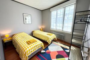 Appartements Grand appartement Cosy - Terrasse - 50m de l’ocean : photos des chambres