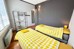 Appartements Grand appartement Cosy - Terrasse - 50m de l’ocean : photos des chambres