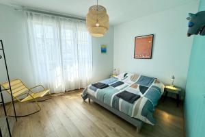 Appartements Grand appartement Cosy - Terrasse - 50m de l’ocean : photos des chambres