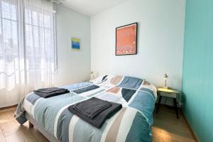 Appartements Grand appartement Cosy - Terrasse - 50m de l’ocean : photos des chambres