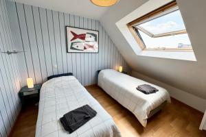 Appartements Grand appartement Cosy - Terrasse - 50m de l’ocean : photos des chambres