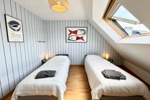 Appartements Grand appartement Cosy - Terrasse - 50m de l’ocean : photos des chambres