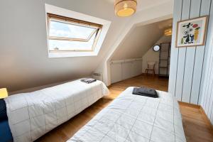 Appartements Grand appartement Cosy - Terrasse - 50m de l’ocean : photos des chambres