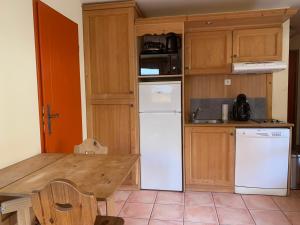 Appartements Hameau Pra Roustan by Godille : photos des chambres
