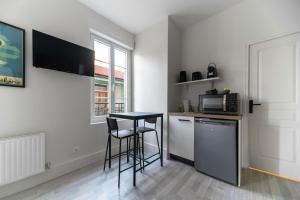 Residence Desroziers - Appartements design en centre ville : photos des chambres