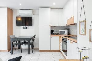 Appartements ST LAURENT - Appartement au calme avec terrasse & parking : photos des chambres