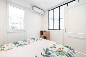 Appartements ST LAURENT - Appartement au calme avec terrasse & parking : photos des chambres