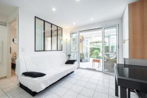 Appartements ST LAURENT - Appartement au calme avec terrasse & parking : photos des chambres