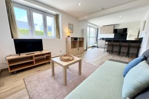 Appartements Joli appartement neuf Jardin 500 m des plages : photos des chambres
