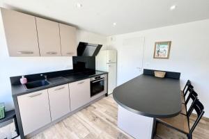 Appartements Joli appartement neuf Jardin 500 m des plages : photos des chambres