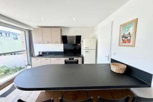 Appartements Joli appartement neuf Jardin 500 m des plages : photos des chambres