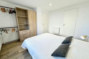 Appartements Joli appartement neuf Jardin 500 m des plages : photos des chambres