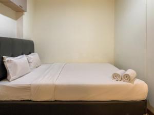 Warm and Homey 1BR at Belmont Residence Puri Apartment By Travelio