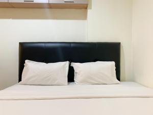 Warm and Homey 1BR at Belmont Residence Puri Apartment By Travelio