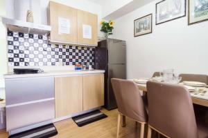 Azure skyview 1BR netflix karaoke ps3 Airport