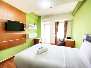 Homey Studio Apartment at Oxford Jatinangor By Travelio