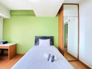 Homey Studio Apartment at Oxford Jatinangor By Travelio