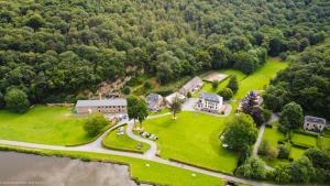 Maisons de vacances Tiny House dans les Bois Une Evasion Cozy pour Deux ! : photos des chambres