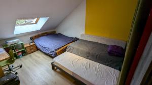 Maisons de vacances Maison Tranquille proche Paris et parc Asteric : photos des chambres