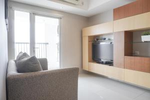Nice and Comfort 1BR at The Wave Kuningan Apartment By Travelio