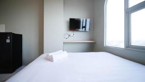 New and Modern Studio at The City Square Apartment By Travelio