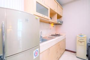 Wonderful and Homey 2BR Apartment Bellagio Residence By Travelio