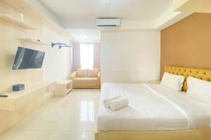 Best Location and Simply Studio Room at Bassura City Apartment By Travelio