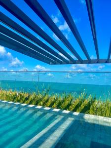 Flat moderno com Vista para o Mar