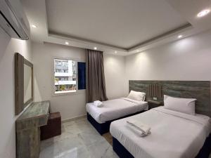 2-bedroom with pool view in Fanadir Bay Resort with free beach and pool access