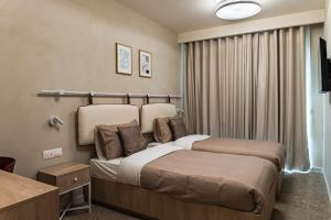 Travi Boutique By Holi