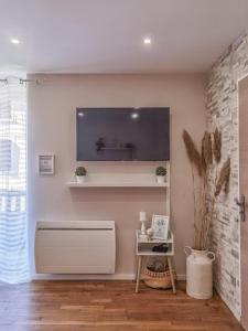 Appartements Verriere & parement en centre-ville : photos des chambres