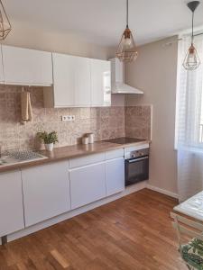 Appartements Verriere & parement en centre-ville : photos des chambres