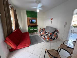 Apto térreo Frente mar c garagem e dois banheiros