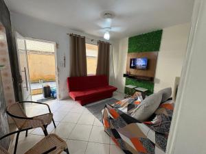 Apto térreo Frente mar c garagem e dois banheiros