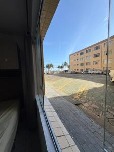 Apto térreo Frente mar c garagem e dois banheiros