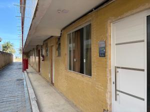 Apto térreo Frente mar c garagem e dois banheiros