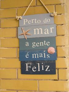 Apto térreo Frente mar c garagem e dois banheiros