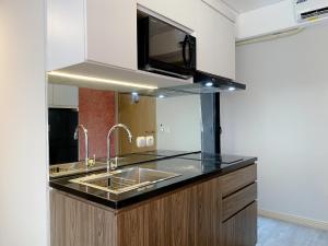 Best Modern 2BR at Meikarta Apartment By Travelio