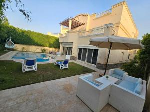 Standalone Villa in New Cairo, Private swimming pool and modern furniture