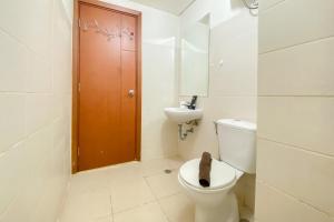 Luxury 2BR at Apartment Woodland Park Residence By Travelio