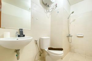 Luxury 2BR at Apartment Woodland Park Residence By Travelio