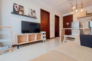 Modern Look and Comfy 1BR Asatti Apartment By Travelio