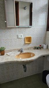 Linda casa a poucos passos do mar