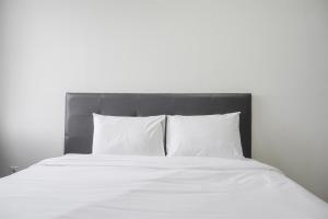 Comfort 2BR at Gold Coast Apartment By Travelio