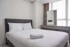 Comfort 2BR at Gold Coast Apartment By Travelio