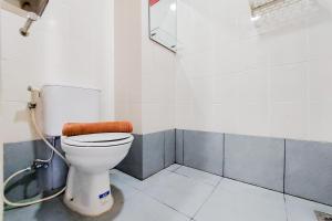 Minimalist and Warm Studio Room Akasa Pure Living BSD Apartment By Travelio