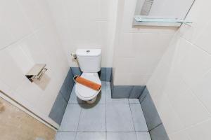 Minimalist and Warm Studio Room Akasa Pure Living BSD Apartment By Travelio